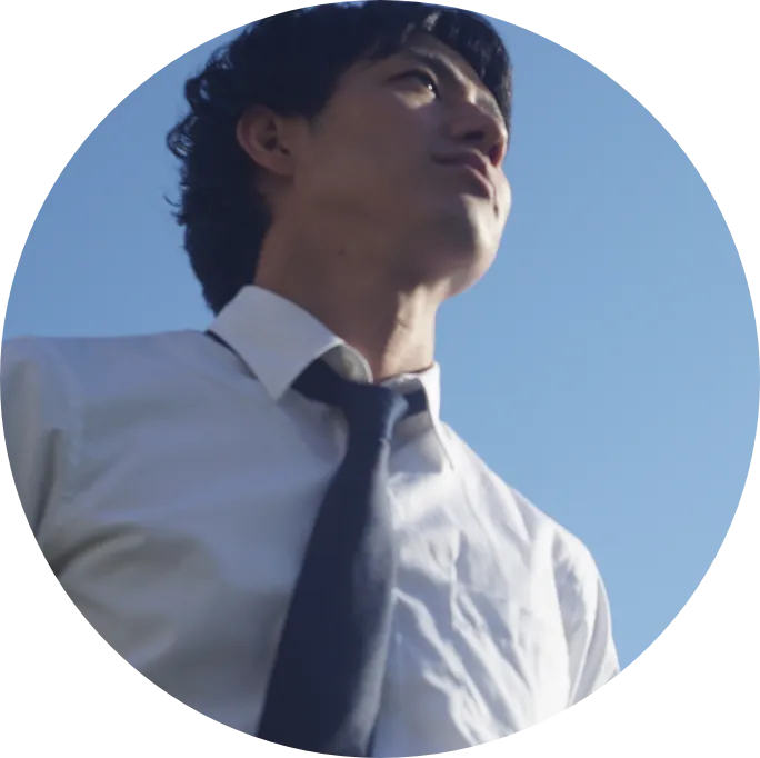 鞄を持つ人の画像