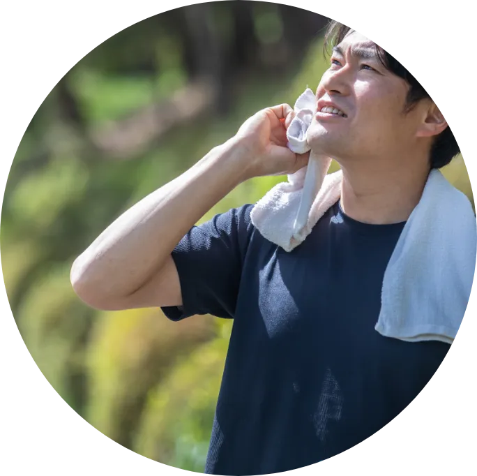 汗をふく人の画像